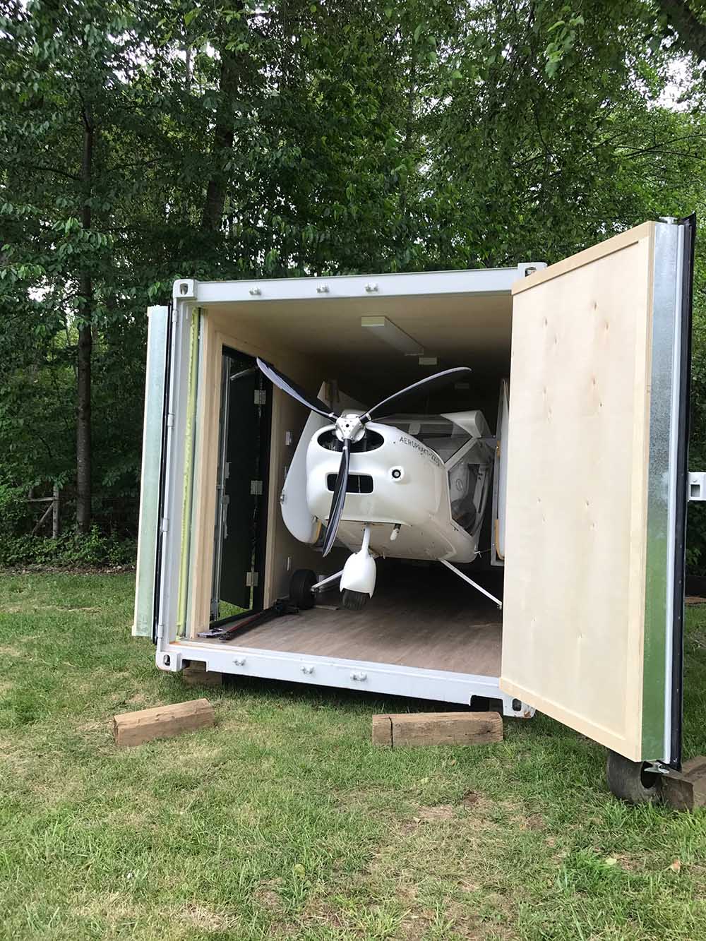 Flight school classroom by summer, airplane storage unit by winter - Port Shipping Containers