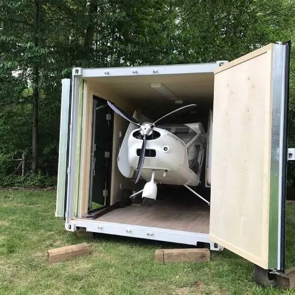 Flight school classroom by summer, airplane storage unit by winter - Port Shipping Containers